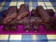 Barrette proteiche al cocco ricoperte di cioccolato fondente
